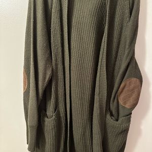 Olive green hoodie sweater with brown patches on the elbow